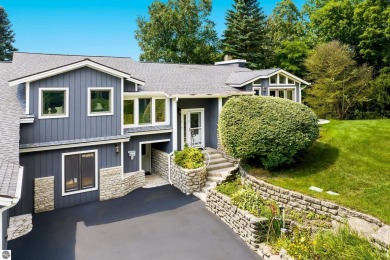 Beautiful view of Crystal Lake from this updated 4 BR home on Crystal Lake Golf Club in Michigan - for sale on GolfHomes.com, golf home, golf lot