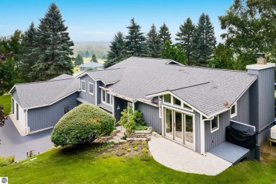 Beautiful view of Crystal Lake from this updated 4 BR home on Crystal Lake Golf Club in Michigan - for sale on GolfHomes.com, golf home, golf lot