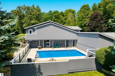 Beautiful view of Crystal Lake from this updated 4 BR home on Crystal Lake Golf Club in Michigan - for sale on GolfHomes.com, golf home, golf lot
