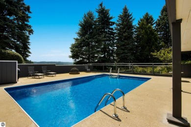 Beautiful view of Crystal Lake from this updated 4 BR home on Crystal Lake Golf Club in Michigan - for sale on GolfHomes.com, golf home, golf lot
