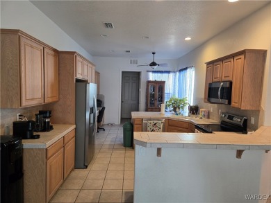Great Desert Lakes home in an established neighborhood near the on Desert Lakes Golf Course in Arizona - for sale on GolfHomes.com, golf home, golf lot