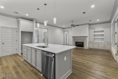 Welcome to this beautiful 4 bedroom, 2.5 bath home located in on Lake Caroline Golf Club in Mississippi - for sale on GolfHomes.com, golf home, golf lot