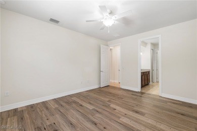 You don't have to wait to build new with this spacious move-in on River Hall Country Club in Florida - for sale on GolfHomes.com, golf home, golf lot