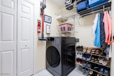 This is a must see Condo ~ tastefully updated, meticulously on Cypress Lake Country Club in Florida - for sale on GolfHomes.com, golf home, golf lot