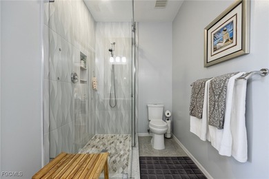 This is a must see Condo ~ tastefully updated, meticulously on Cypress Lake Country Club in Florida - for sale on GolfHomes.com, golf home, golf lot