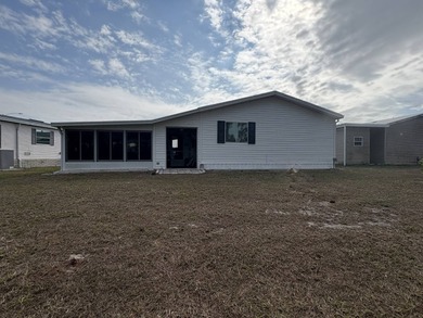 This outstanding home is located in the most sought-after 55+ on Sabal Springs Golf and Racquet Club in Florida - for sale on GolfHomes.com, golf home, golf lot