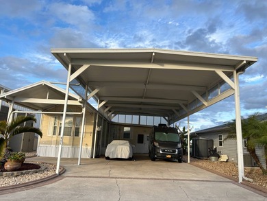 Furnished Park Model with large addition, double RV port, 2 on Deer Creek RV Golf Resort in Florida - for sale on GolfHomes.com, golf home, golf lot