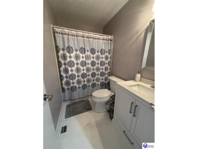 Experience low-maintenance living with beautiful views of the on Doe Valley Country Club in Kentucky - for sale on GolfHomes.com, golf home, golf lot