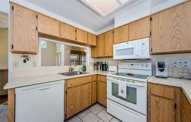 Welcome to carefree Florida living in this move-in ready on Summertree Golf Course in Florida - for sale on GolfHomes.com, golf home, golf lot
