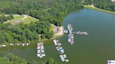 Experience low-maintenance living with beautiful views of the on Doe Valley Country Club in Kentucky - for sale on GolfHomes.com, golf home, golf lot