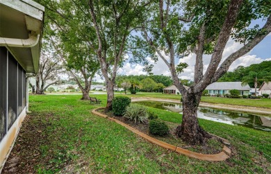 Welcome to carefree Florida living in this move-in ready on Summertree Golf Course in Florida - for sale on GolfHomes.com, golf home, golf lot
