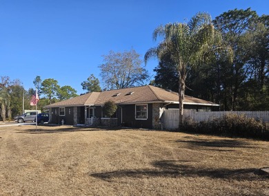 Potential, Potential, Potential! This 3 bedroom, 2 bath home has on Citrus Springs Country Club in Florida - for sale on GolfHomes.com, golf home, golf lot