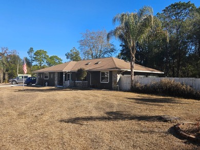Potential, Potential, Potential! This 3 bedroom, 2 bath home has on Citrus Springs Country Club in Florida - for sale on GolfHomes.com, golf home, golf lot