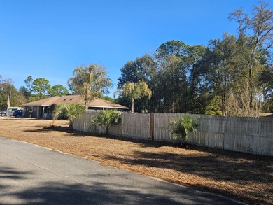 Potential, Potential, Potential! This 3 bedroom, 2 bath home has on Citrus Springs Country Club in Florida - for sale on GolfHomes.com, golf home, golf lot