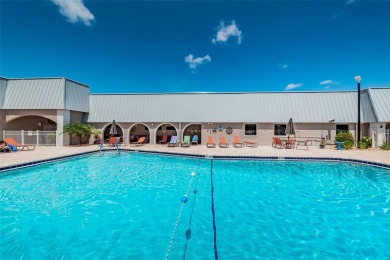 Welcome to carefree Florida living in this move-in ready on Summertree Golf Course in Florida - for sale on GolfHomes.com, golf home, golf lot