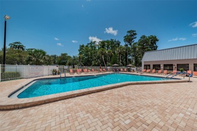 Welcome to carefree Florida living in this move-in ready on Summertree Golf Course in Florida - for sale on GolfHomes.com, golf home, golf lot