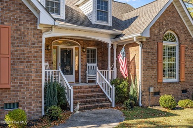 With many recent updates and curb appeal galore, this attractive on Washington Yacht and Country Club in North Carolina - for sale on GolfHomes.com, golf home, golf lot