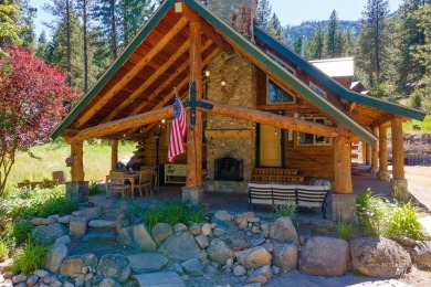 Introducing a one-of-a-kind hand-hewn log cabin nestled in the on Terrace Lakes Golf Resort in Idaho - for sale on GolfHomes.com, golf home, golf lot