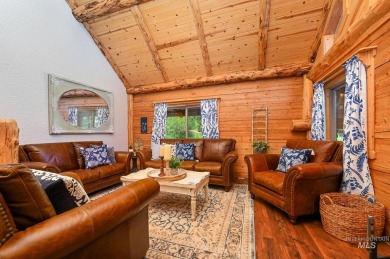 Introducing a one-of-a-kind hand-hewn log cabin nestled in the on Terrace Lakes Golf Resort in Idaho - for sale on GolfHomes.com, golf home, golf lot