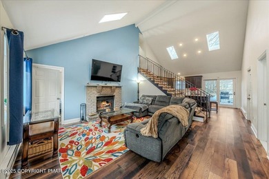 Do not miss this turnkey, fully furnished, and STR-ready in on Pocono Farms Country Club in Pennsylvania - for sale on GolfHomes.com, golf home, golf lot