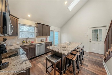 Do not miss this turnkey, fully furnished, and STR-ready in on Pocono Farms Country Club in Pennsylvania - for sale on GolfHomes.com, golf home, golf lot