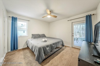 Do not miss this turnkey, fully furnished, and STR-ready in on Pocono Farms Country Club in Pennsylvania - for sale on GolfHomes.com, golf home, golf lot