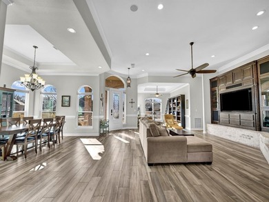 Impressive curb appeal welcomes you from the moment you arrive on Pecan Plantation Country Club in Texas - for sale on GolfHomes.com, golf home, golf lot