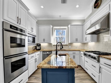 Impressive curb appeal welcomes you from the moment you arrive on Pecan Plantation Country Club in Texas - for sale on GolfHomes.com, golf home, golf lot