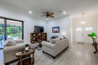 Elegant newer-construction pool home in gated Country Club on St. Lucie Trail Golf Club in Florida - for sale on GolfHomes.com, golf home, golf lot