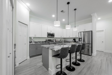 Elegant newer-construction pool home in gated Country Club on St. Lucie Trail Golf Club in Florida - for sale on GolfHomes.com, golf home, golf lot