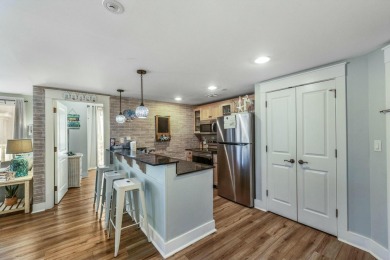 Escape to coastal luxury in this exquisite two-bedroom two-bath on Sandestin Golf and Beach Resort - Raven in Florida - for sale on GolfHomes.com, golf home, golf lot