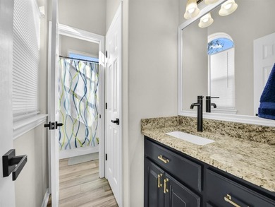 Impressive curb appeal welcomes you from the moment you arrive on Pecan Plantation Country Club in Texas - for sale on GolfHomes.com, golf home, golf lot