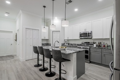 Elegant newer-construction pool home in gated Country Club on St. Lucie Trail Golf Club in Florida - for sale on GolfHomes.com, golf home, golf lot