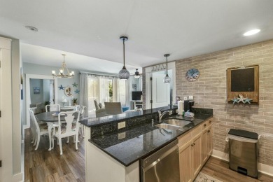 Escape to coastal luxury in this exquisite two-bedroom two-bath on Sandestin Golf and Beach Resort - Raven in Florida - for sale on GolfHomes.com, golf home, golf lot