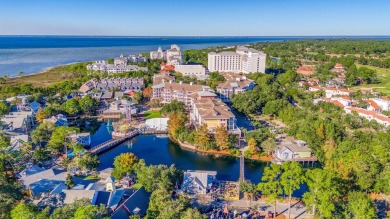 Escape to coastal luxury in this exquisite two-bedroom two-bath on Sandestin Golf and Beach Resort - Raven in Florida - for sale on GolfHomes.com, golf home, golf lot