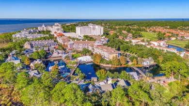 Escape to coastal luxury in this exquisite two-bedroom two-bath on Sandestin Golf and Beach Resort - Raven in Florida - for sale on GolfHomes.com, golf home, golf lot