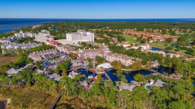 Escape to coastal luxury in this exquisite two-bedroom two-bath on Sandestin Golf and Beach Resort - Raven in Florida - for sale on GolfHomes.com, golf home, golf lot