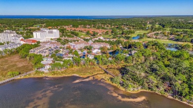 Escape to coastal luxury in this exquisite two-bedroom two-bath on Sandestin Golf and Beach Resort - Raven in Florida - for sale on GolfHomes.com, golf home, golf lot