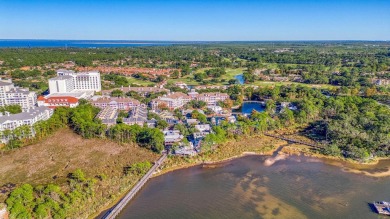Escape to coastal luxury in this exquisite two-bedroom two-bath on Sandestin Golf and Beach Resort - Raven in Florida - for sale on GolfHomes.com, golf home, golf lot