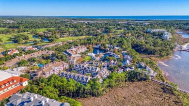 Escape to coastal luxury in this exquisite two-bedroom two-bath on Sandestin Golf and Beach Resort - Raven in Florida - for sale on GolfHomes.com, golf home, golf lot