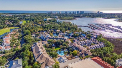 Escape to coastal luxury in this exquisite two-bedroom two-bath on Sandestin Golf and Beach Resort - Raven in Florida - for sale on GolfHomes.com, golf home, golf lot