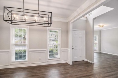 Stunning stucco home in the highly sought-after Summer Grove on Summergrove Golf Club in Georgia - for sale on GolfHomes.com, golf home, golf lot