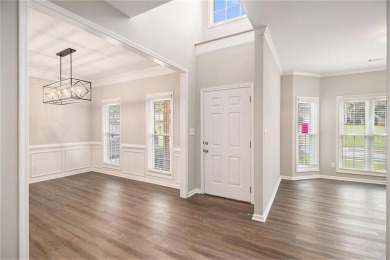 Stunning stucco home in the highly sought-after Summer Grove on Summergrove Golf Club in Georgia - for sale on GolfHomes.com, golf home, golf lot