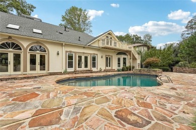Tucked in Atlanta Country Clubs quiet interior, this refreshed on Atlanta Country Club in Georgia - for sale on GolfHomes.com, golf home, golf lot