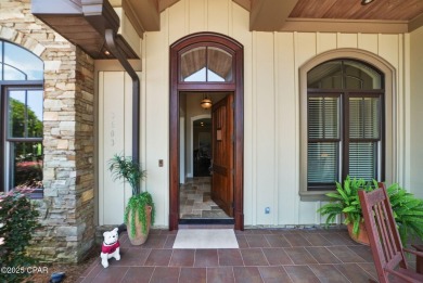 Nestled in a serene setting with views of a pond and golf course on Bay Point Resort Golf Club in Florida - for sale on GolfHomes.com, golf home, golf lot
