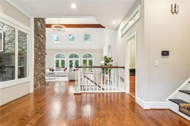 Tucked in Atlanta Country Clubs quiet interior, this refreshed on Atlanta Country Club in Georgia - for sale on GolfHomes.com, golf home, golf lot