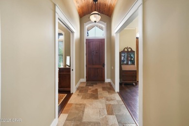 Nestled in a serene setting with views of a pond and golf course on Bay Point Resort Golf Club in Florida - for sale on GolfHomes.com, golf home, golf lot