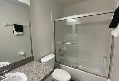 Charming and inviting townhome located in the desirable Fleming on Golf Club At Fleming Island in Florida - for sale on GolfHomes.com, golf home, golf lot