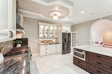 Tucked in Atlanta Country Clubs quiet interior, this refreshed on Atlanta Country Club in Georgia - for sale on GolfHomes.com, golf home, golf lot