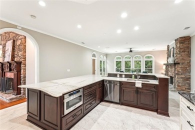 Tucked in Atlanta Country Clubs quiet interior, this refreshed on Atlanta Country Club in Georgia - for sale on GolfHomes.com, golf home, golf lot